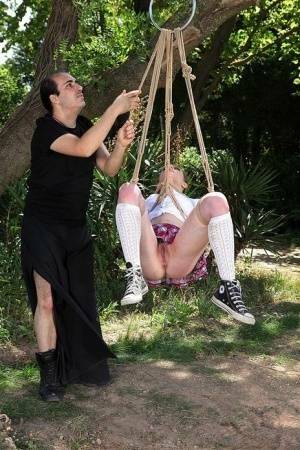 Schoolgirl Samantha Bentley finds herself suspended from ropes in the woods on leakfanatic.com