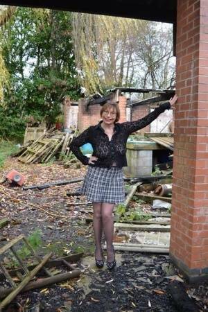 Amateur chick Barby Slut strips to her heels on a demolition site on leakfanatic.com